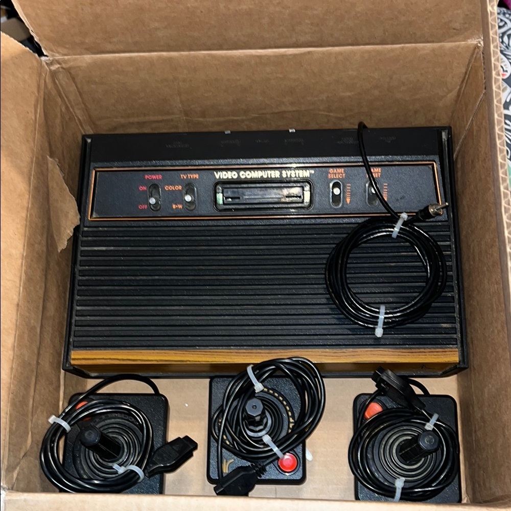 Vintage Video Game Console with Controllers